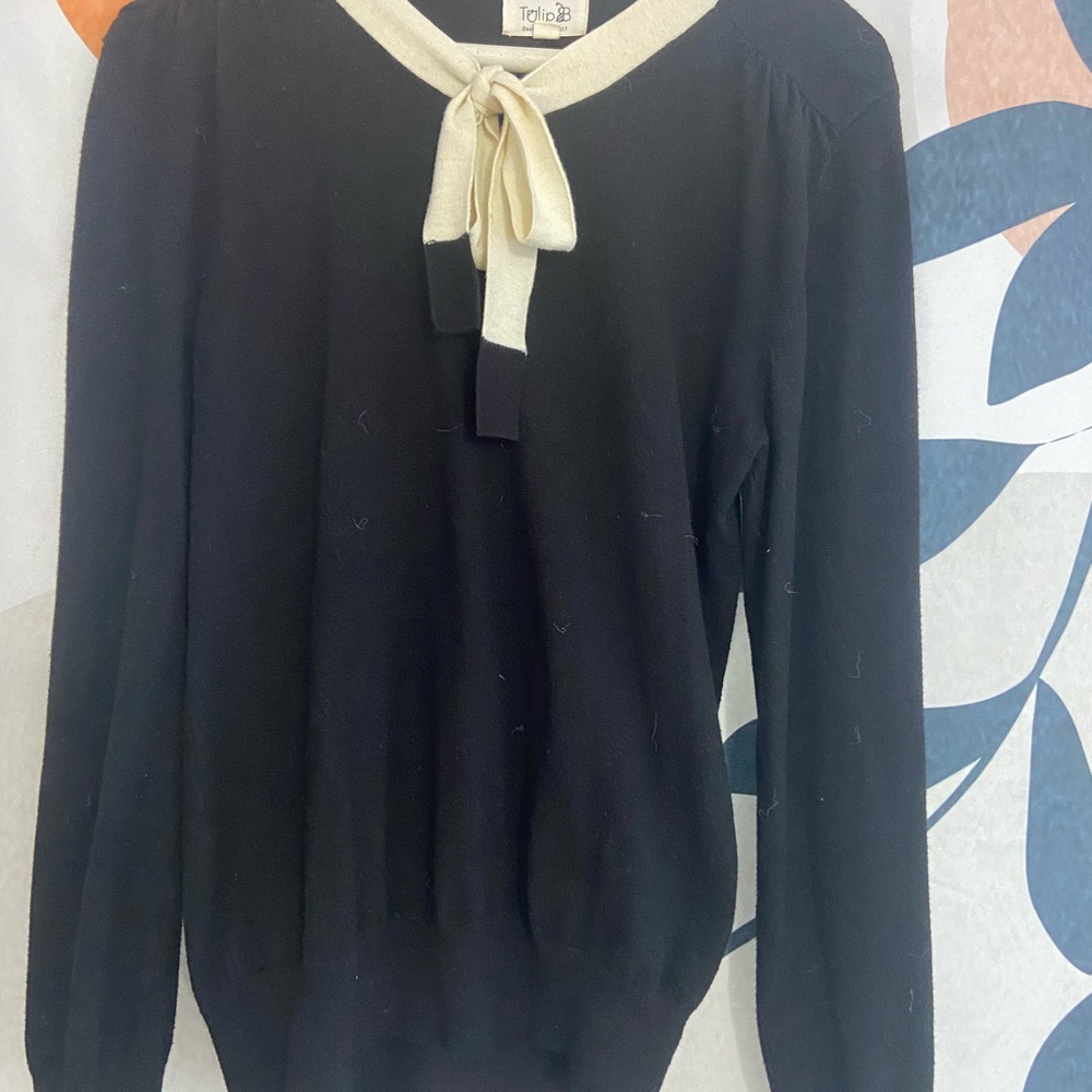 Elegant Black and Cream Sweater with Bow